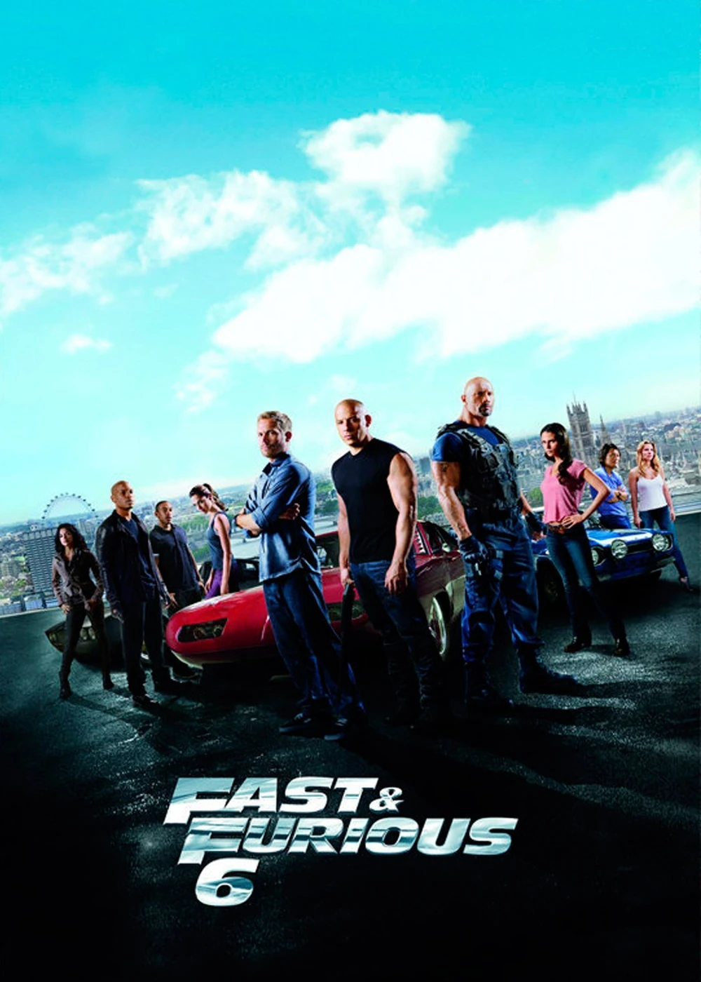Cartel español de Fast & Furious 6: el reparto de pie junto a dos coches en una azotea, con Londres y la noria del London Eye al fondo bajo un cielo azul