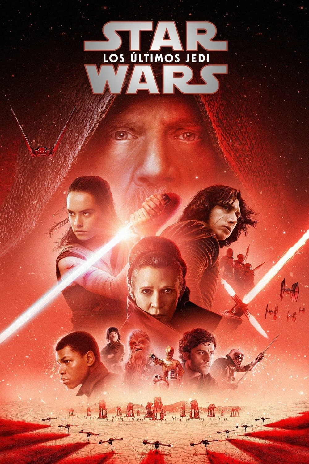 Cartel español de Star Wars: Los últimos Jedi, en tonos rojos: el rostro de Luke Skywalker encapuchado arriba, Rey y Kylo Ren con espadas láser, Leia en el centro y la Resistencia sobre una llanura roja con cazas en la parte baja