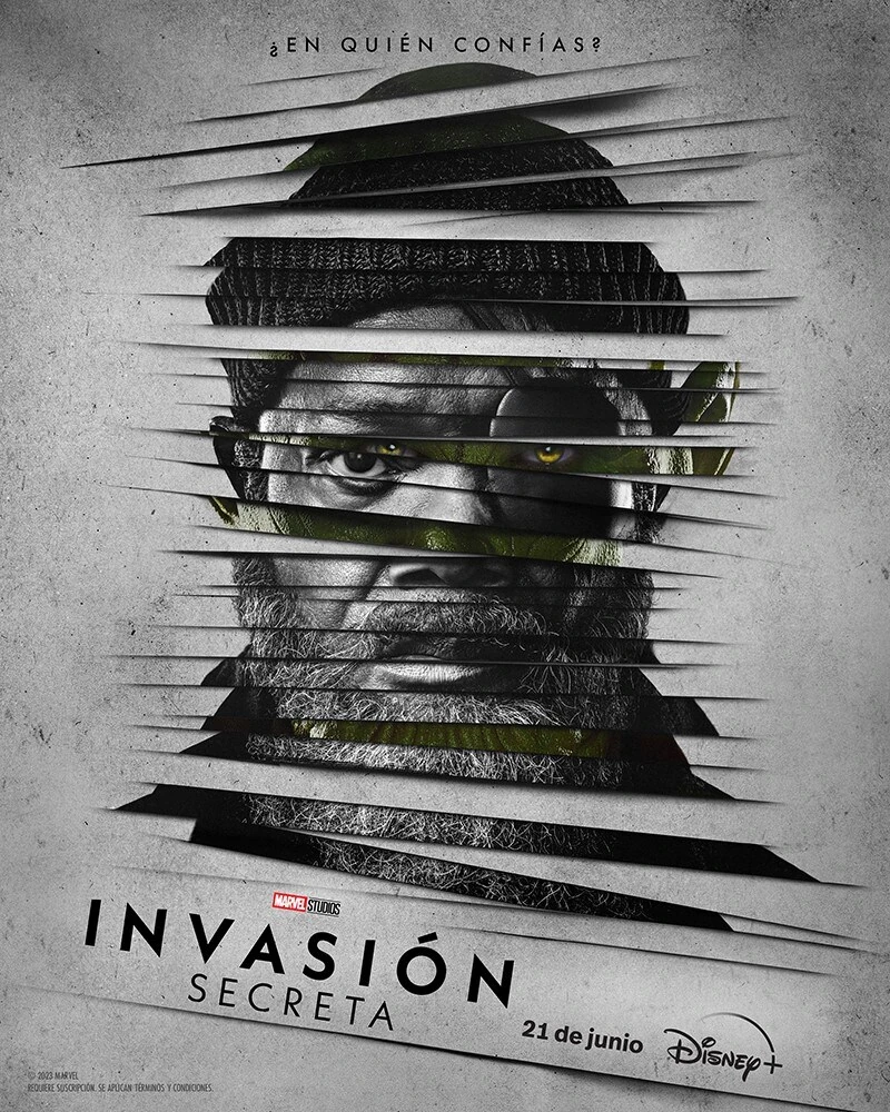 Cartel español de Invasión secreta: el rostro de Samuel L. Jackson cortado en tiras horizontales sobre fondo gris, bajo la frase «¿En quién confías?»